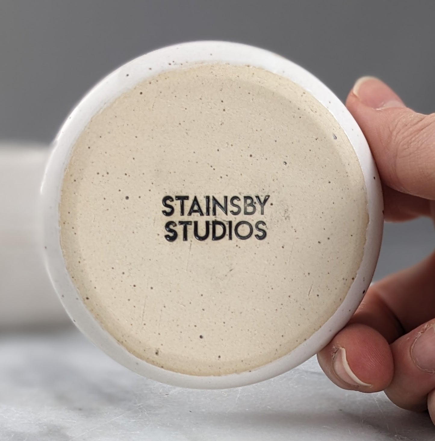 Set of Three White Speckled Dishes