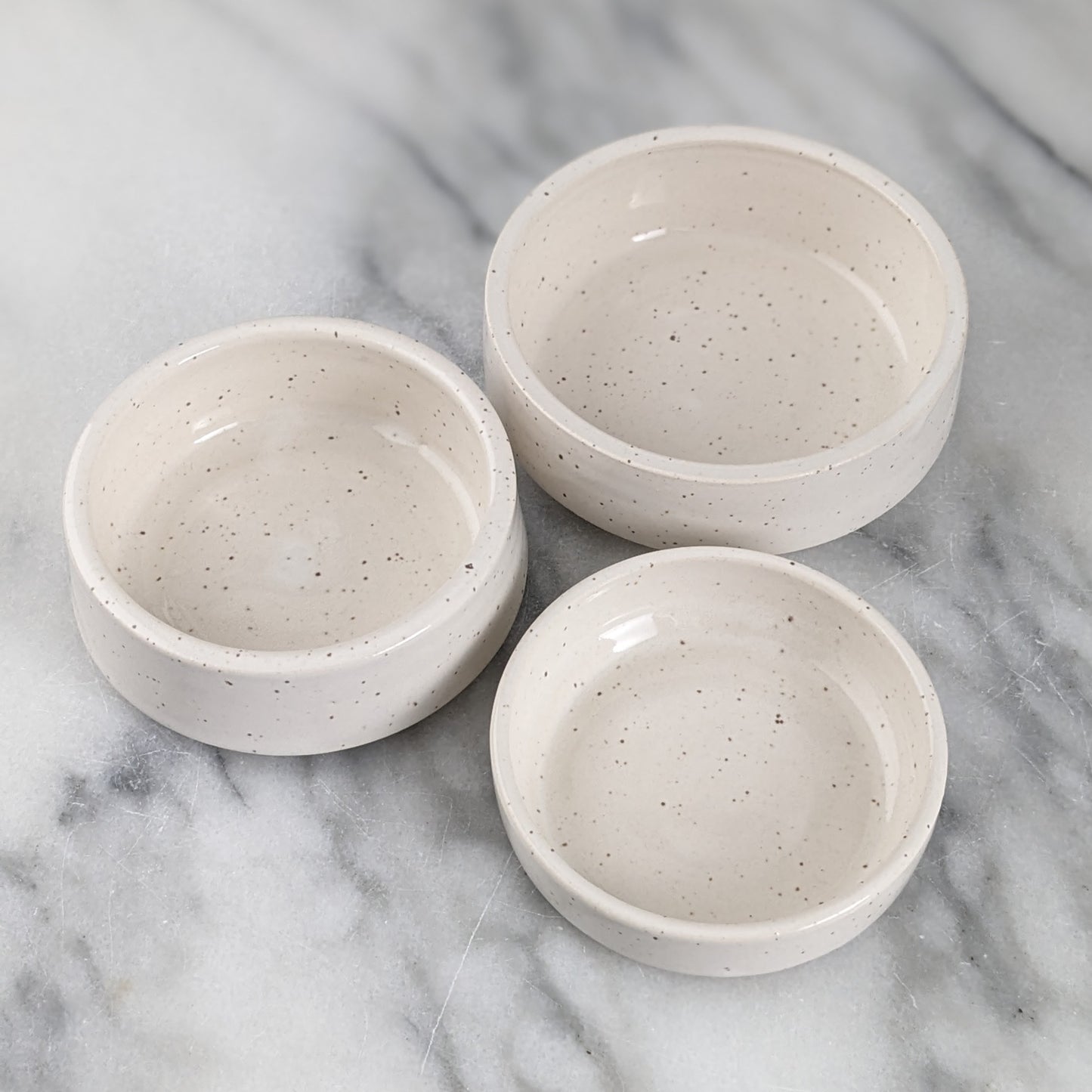 Set of Three White Speckled Dishes