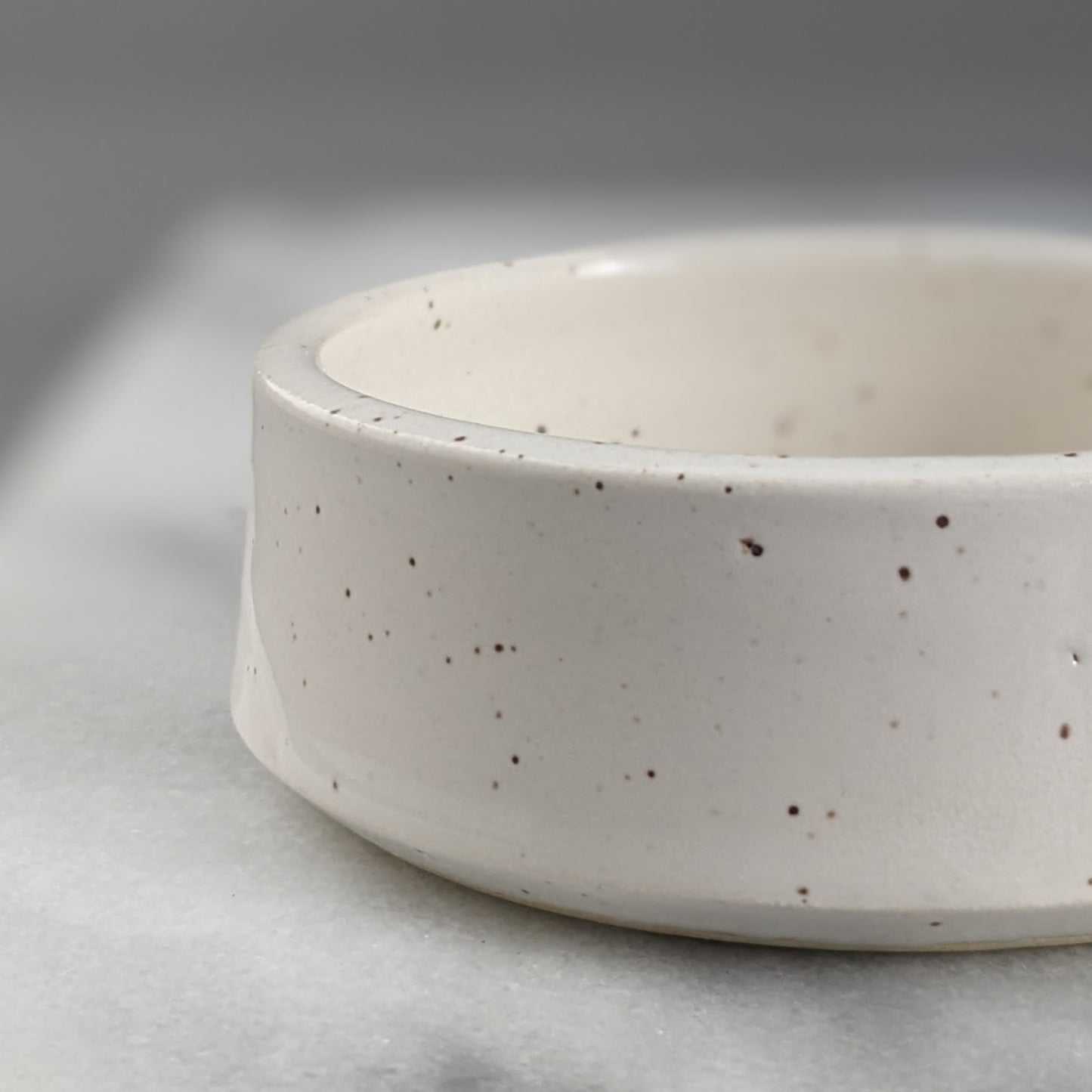 Set of Three White Speckled Dishes